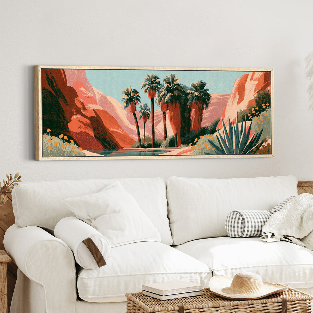 clustered palms beside a blue canvas wall art in an oak finish floater frame in a styled room setting