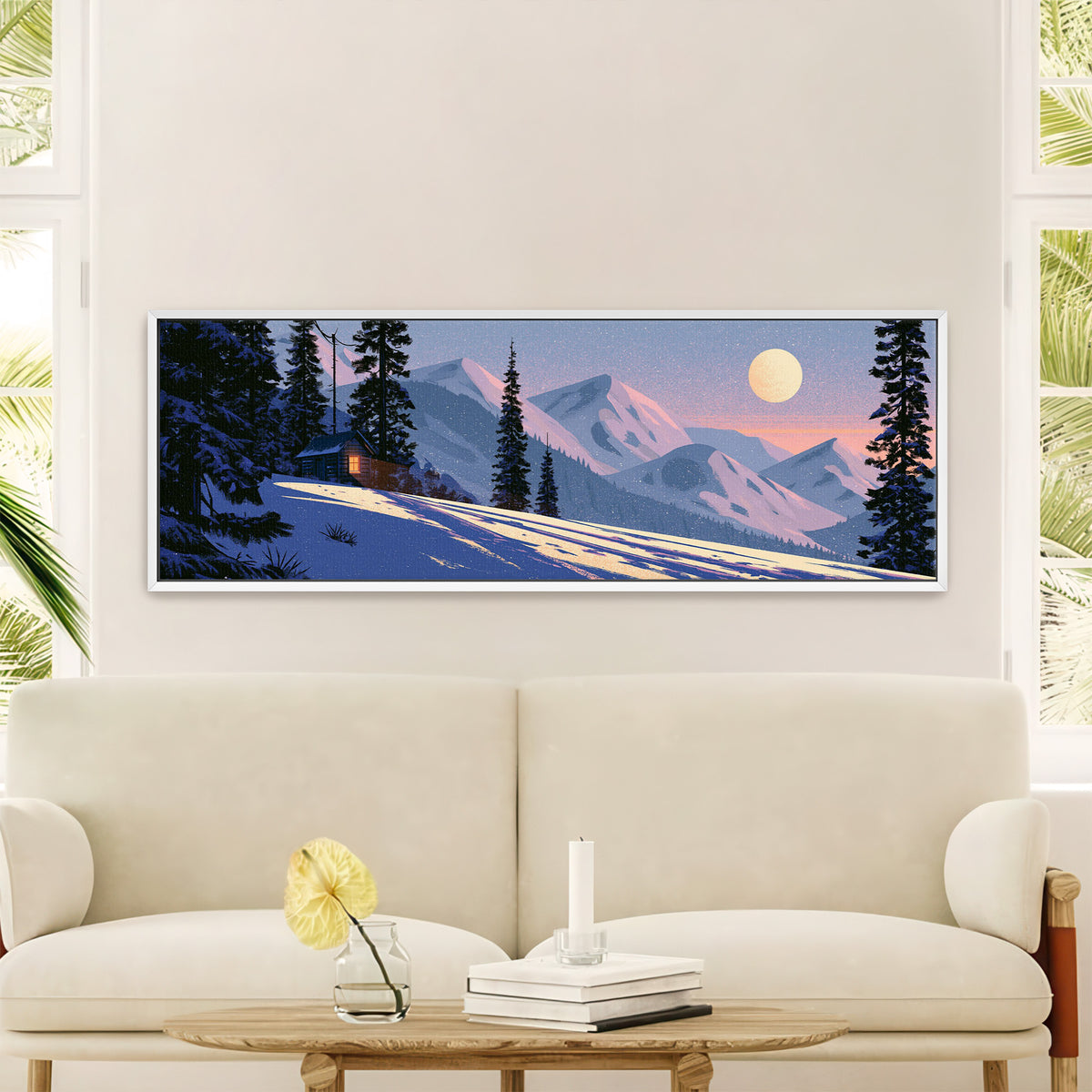 snowbound cabin beneath pink mountain ridges canvas wall art in a white floater frame in a styled room setting