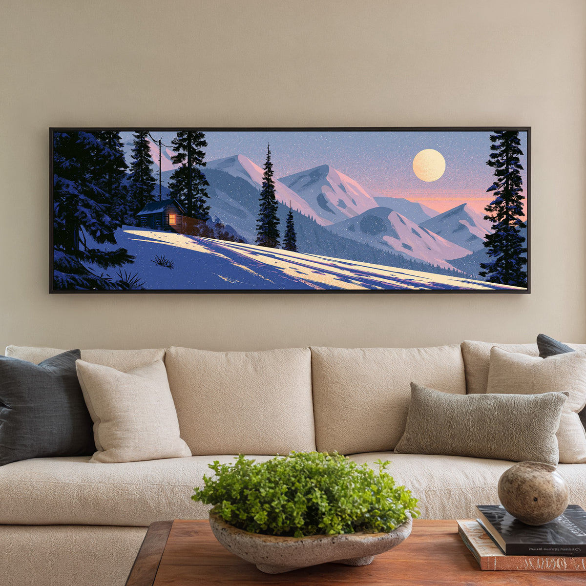 snowbound cabin beneath pink mountain ridges canvas wall art in a black floater frame in a styled room setting