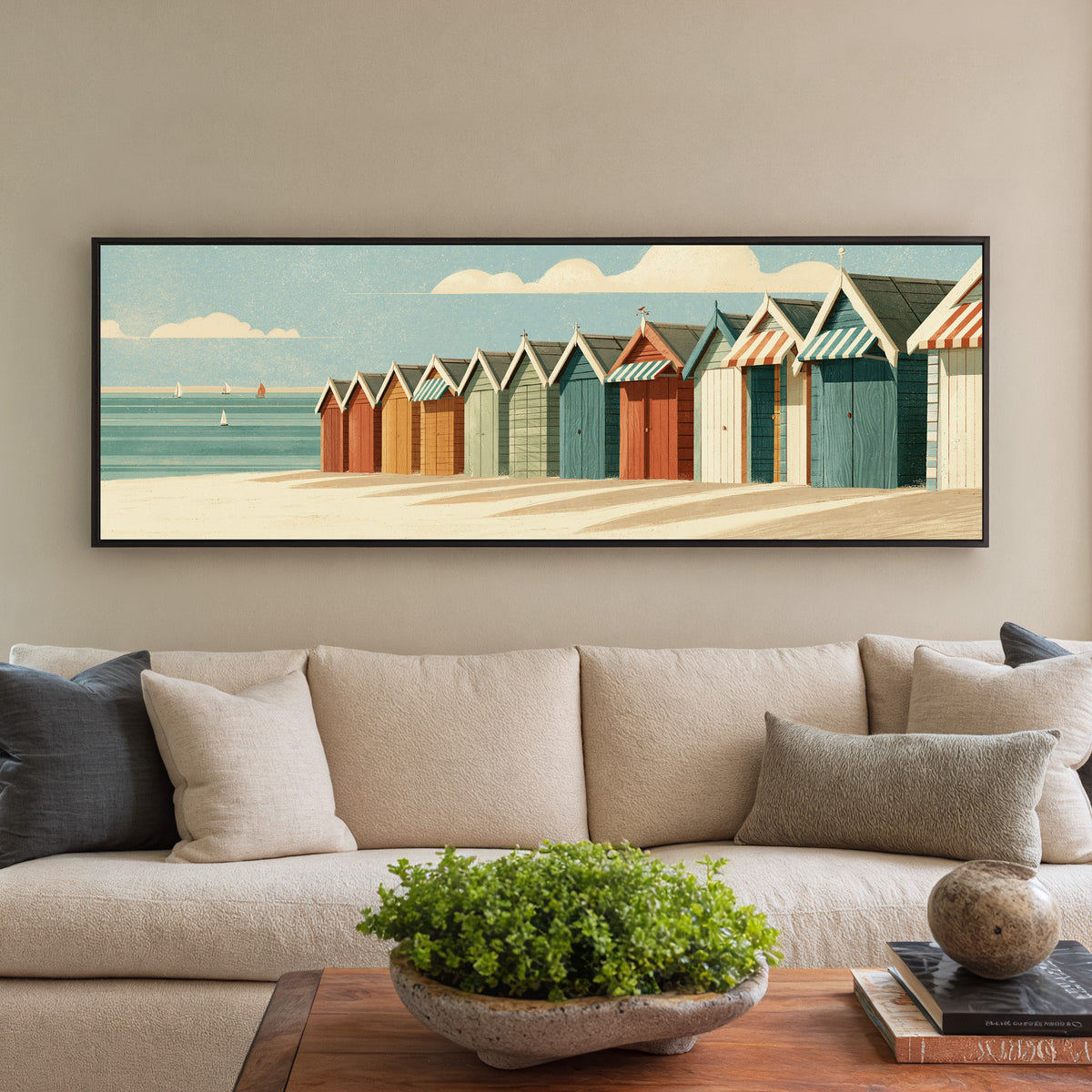 receding beach huts with striped canvas wall art in a black floater frame in a styled room setting