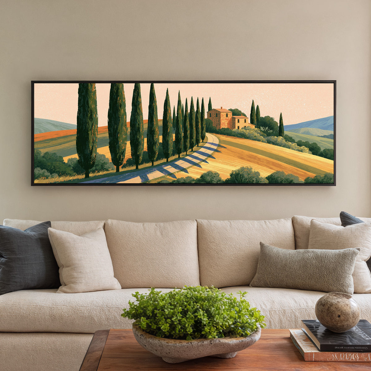 winding country road lined with canvas wall art in a black floater frame in a styled room setting