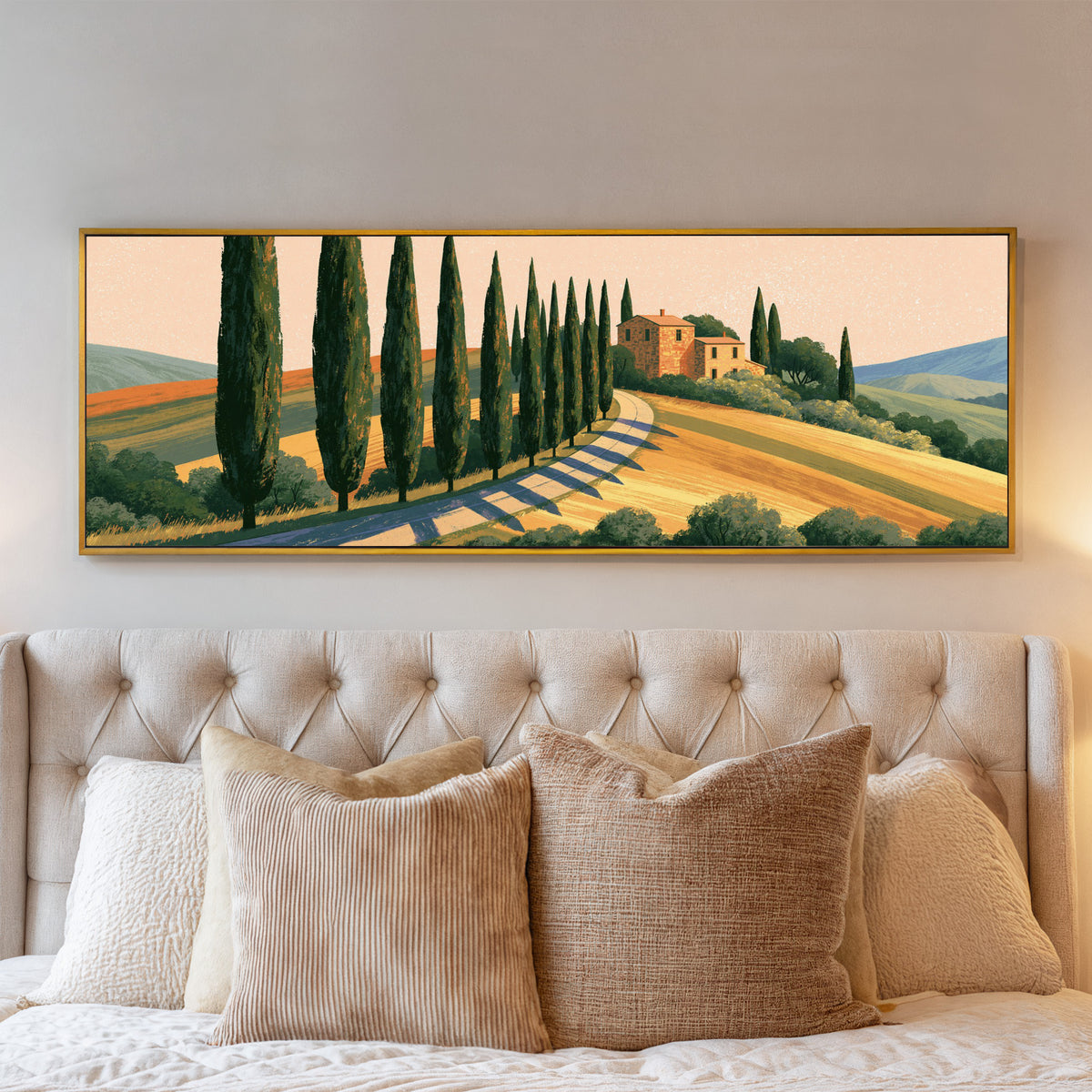 winding country road lined with tall dark trees canvas wall art in a gold floater frame above a bed