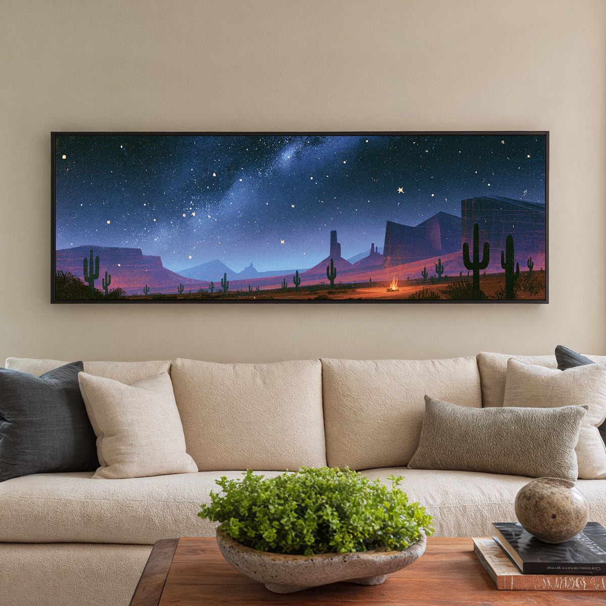 star filled blue sky above desert canvas wall art in a black floater frame in a styled room setting