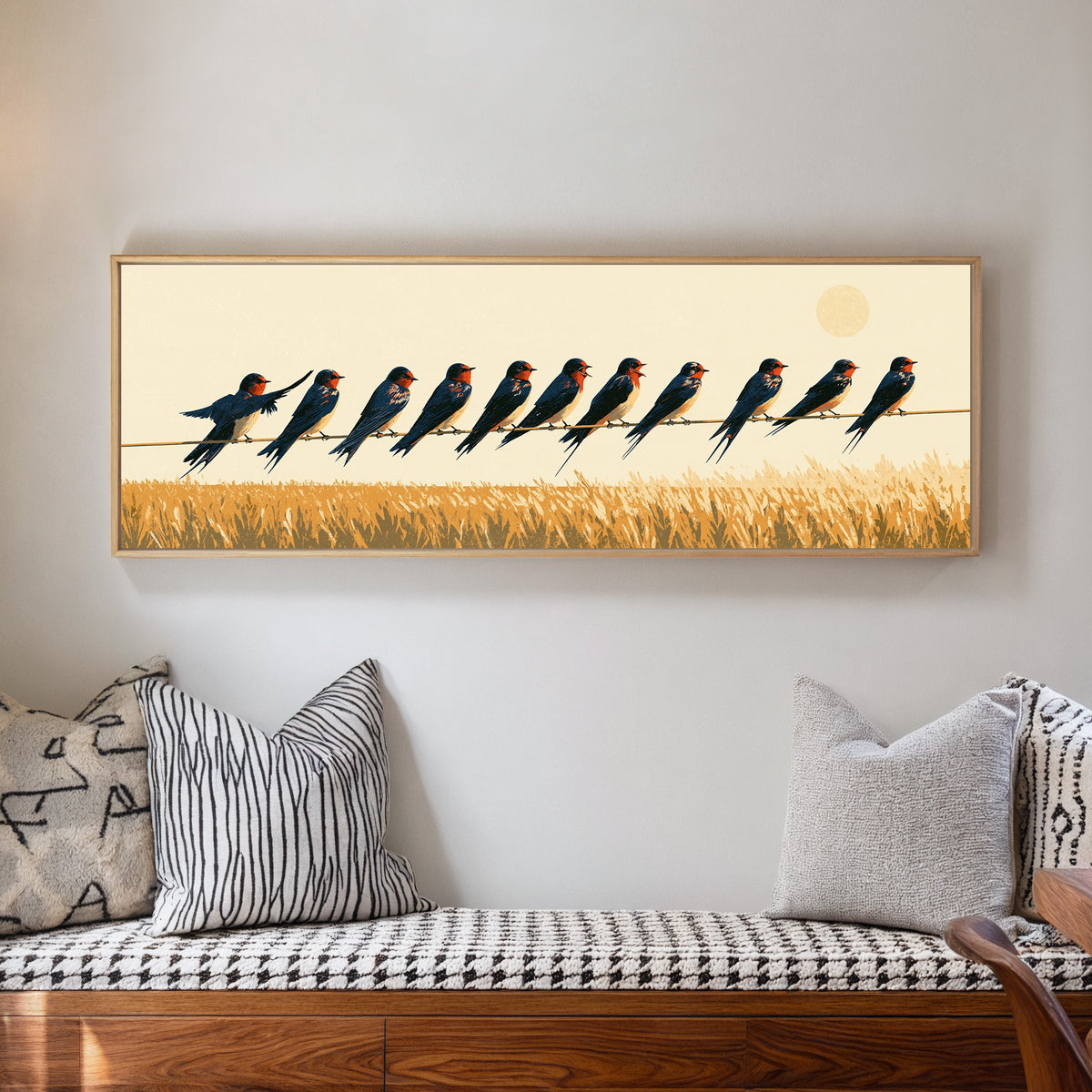 navy barn swallows perched above an ochre field canvas wall art in a natural floater frame in a living room