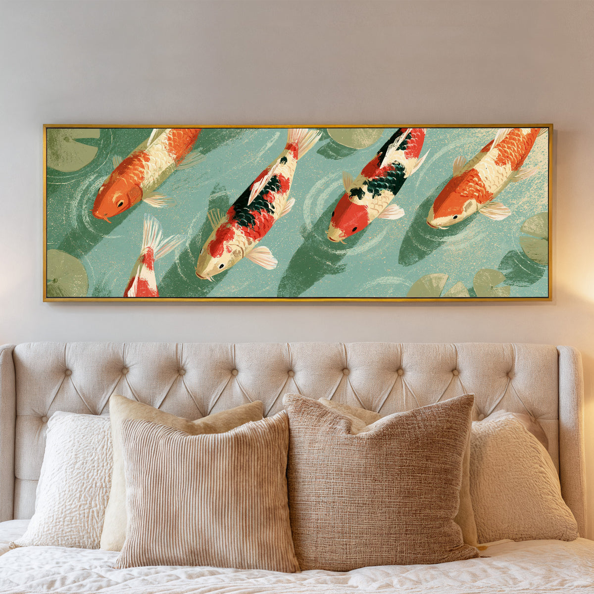 red and cream koi crossing teal water beside canvas wall art in a gold floater frame above a bed