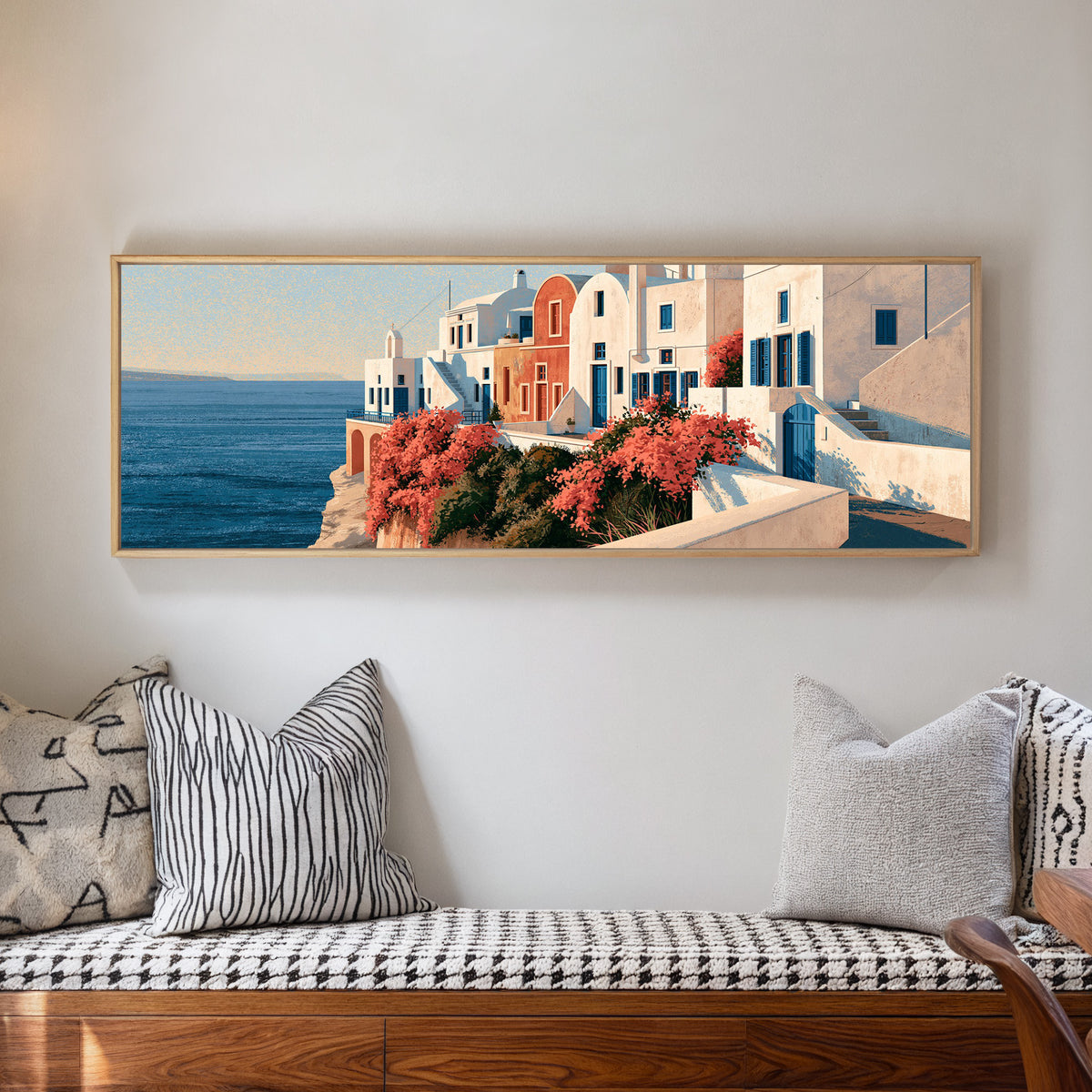 white seaside houses with blue shutters and canvas wall art in a natural floater frame in a living room