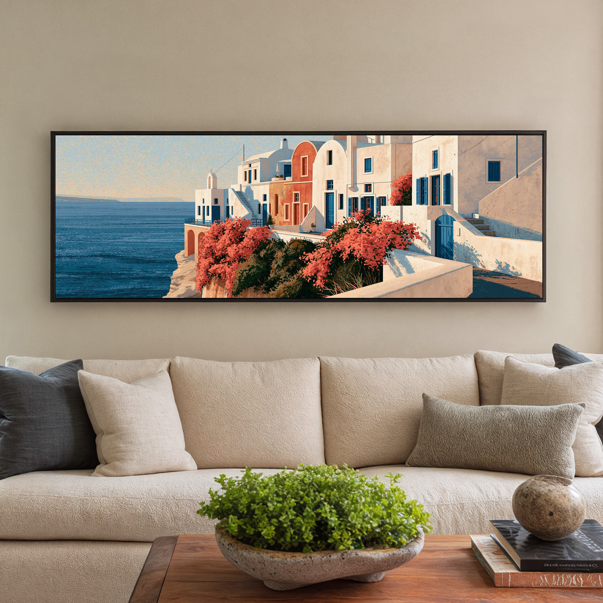 white seaside houses with blue shutters and canvas wall art in a black floater frame in a styled room setting