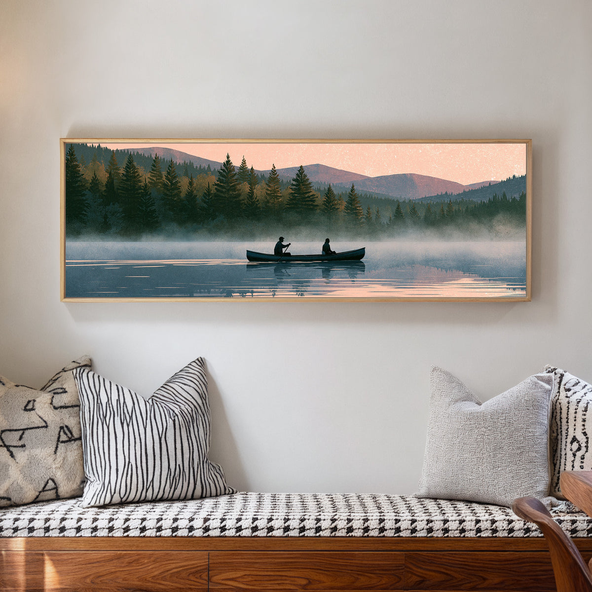 two canoeists on a misty forest lake beneath a canvas wall art in a natural floater frame in a living room