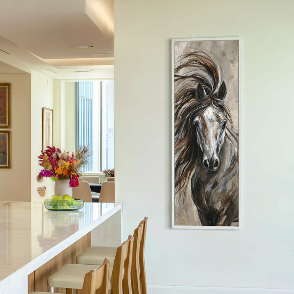 This canvas wall art features a vertical, impressionistic painting of a horse's head with a flowing mane in a palette of grays, browns, and white, framed in white and displayed.