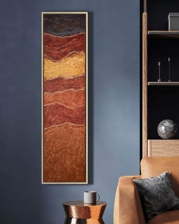 Vertical canvas wall art in interior setting.