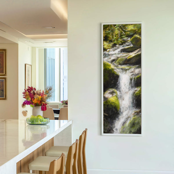 This vertical canvas print features a vibrant, impressionistic painting of a waterfall cascading over moss-covered rocks, framed in white. The artwork is displayed on a neutral wall in what appears.