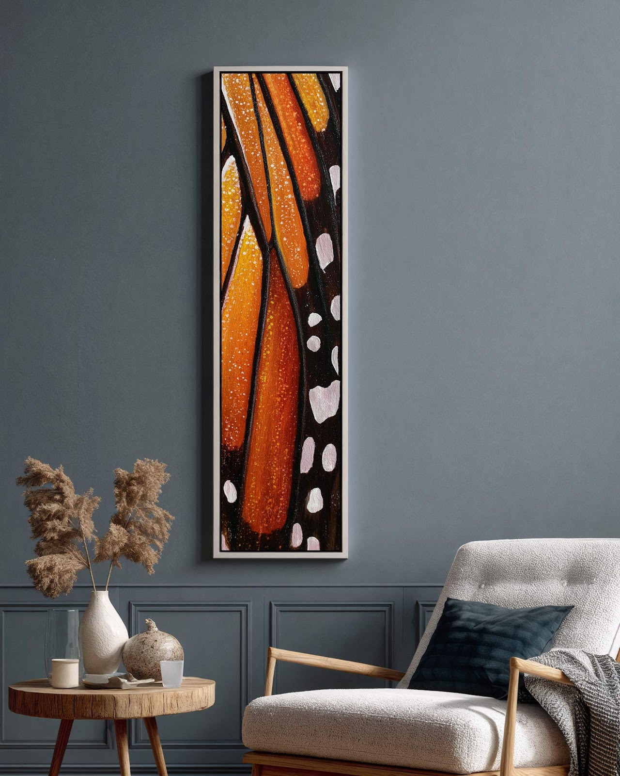 Vertical canvas wall art in interior setting.