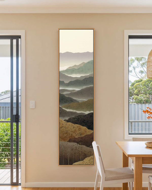 Vertical canvas wall art in interior setting.