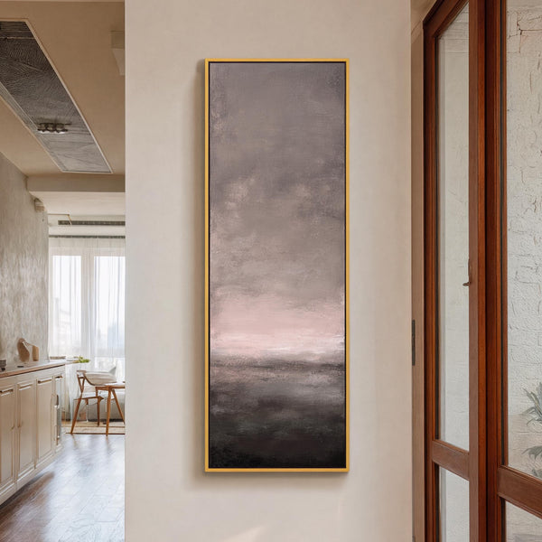 Vertical canvas wall art in interior setting.