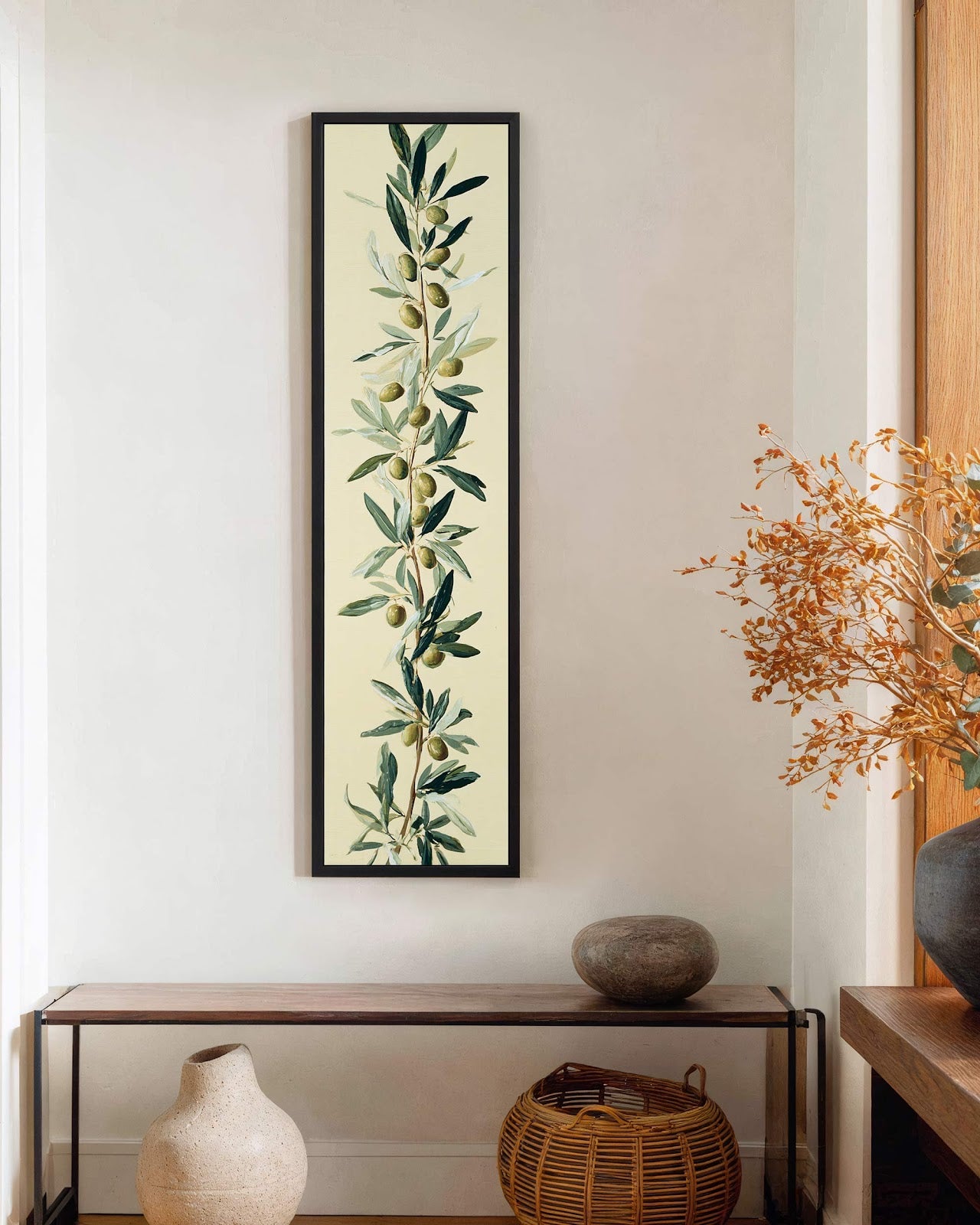 Vertical canvas wall art in interior setting.