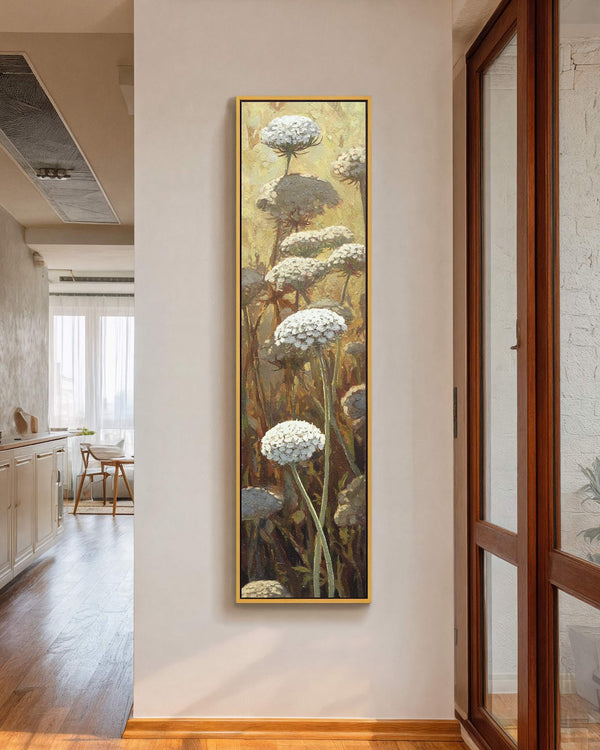 Vertical canvas wall art in interior setting.