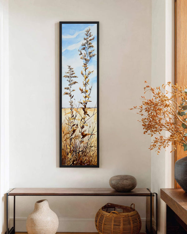 Vertical canvas wall art in interior setting.