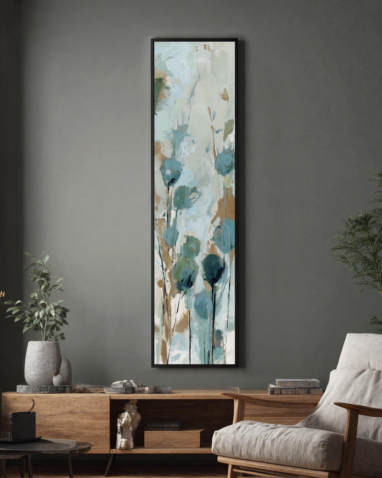 Teal wildflower canvas art in black floating frame on warm gray living room wall beside mid-century furniture, vertical botanical statement piece