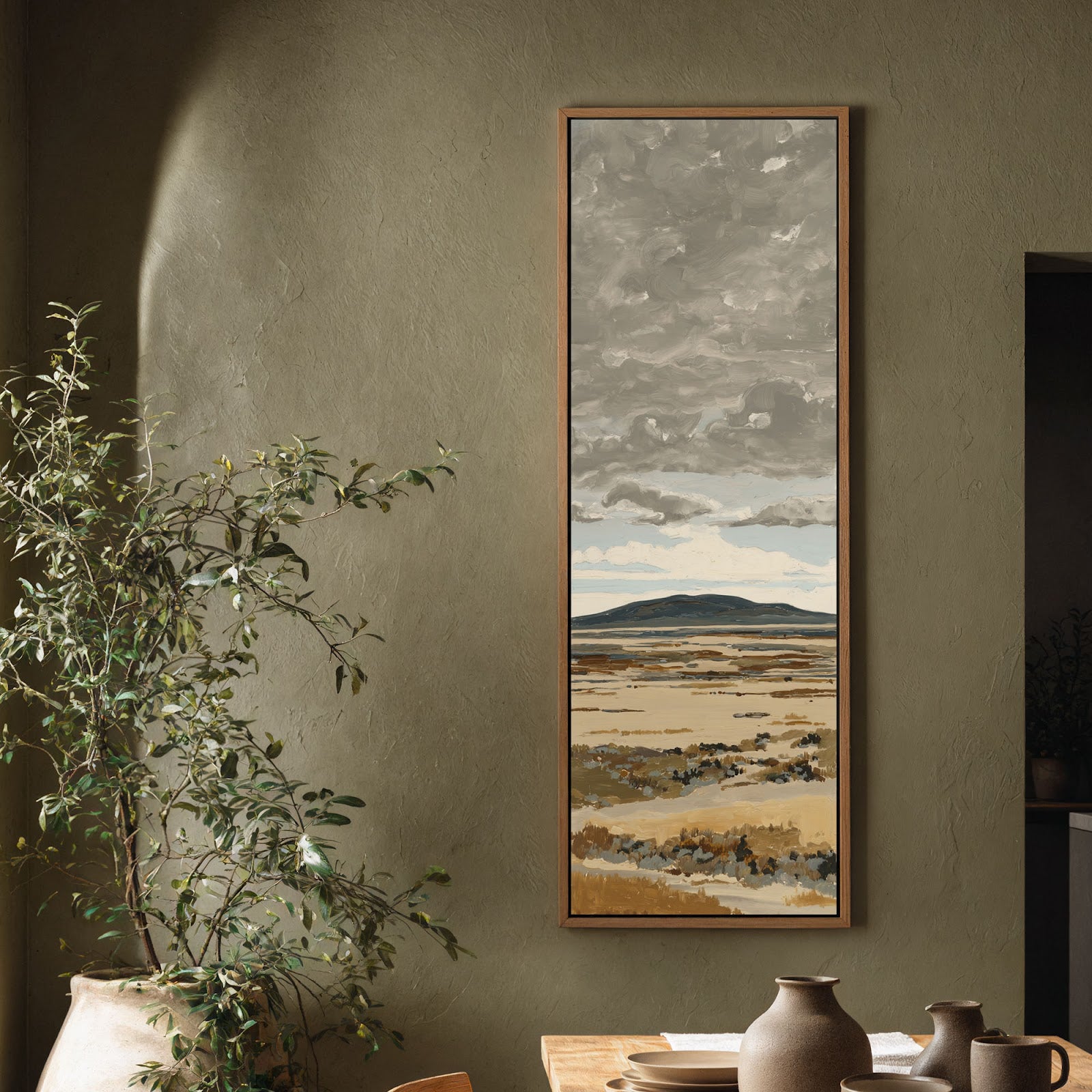 Vertical canvas wall art in interior setting.