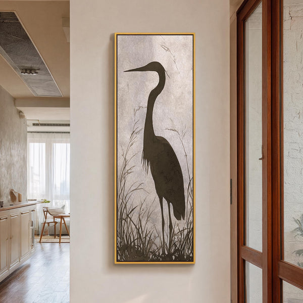 Vertical canvas wall art in interior setting.