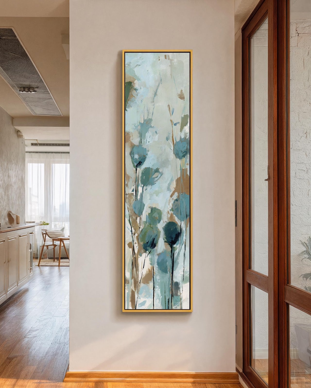 Teal wildflower botanical canvas art in gold floating frame displayed in hallway entryway with cream walls, vertical canvas print for narrow walls
