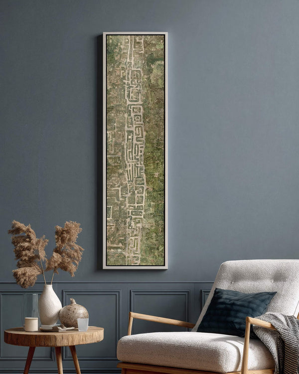 Vertical canvas wall art in interior setting.