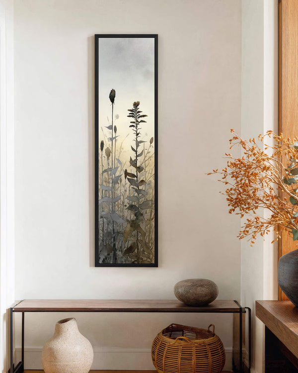 Vertical canvas wall art in interior setting.