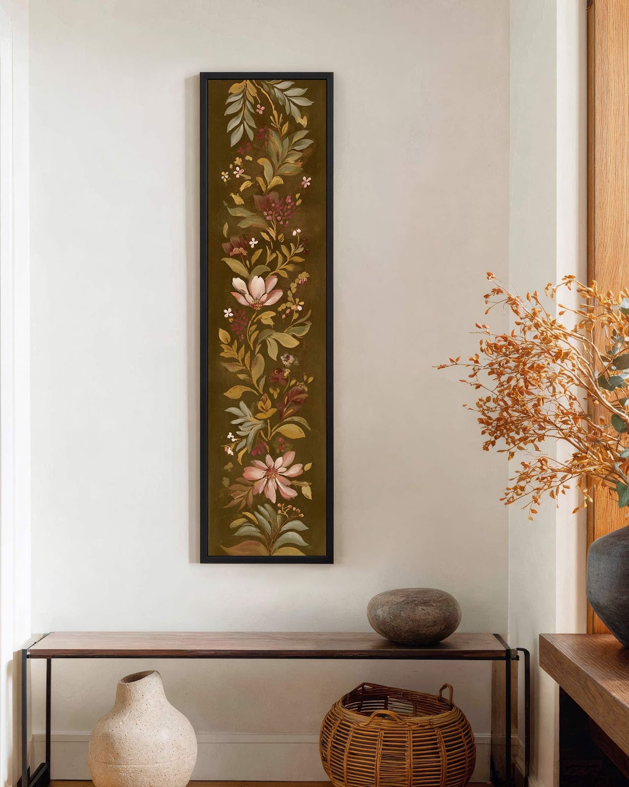 Vertical canvas wall art in interior setting.