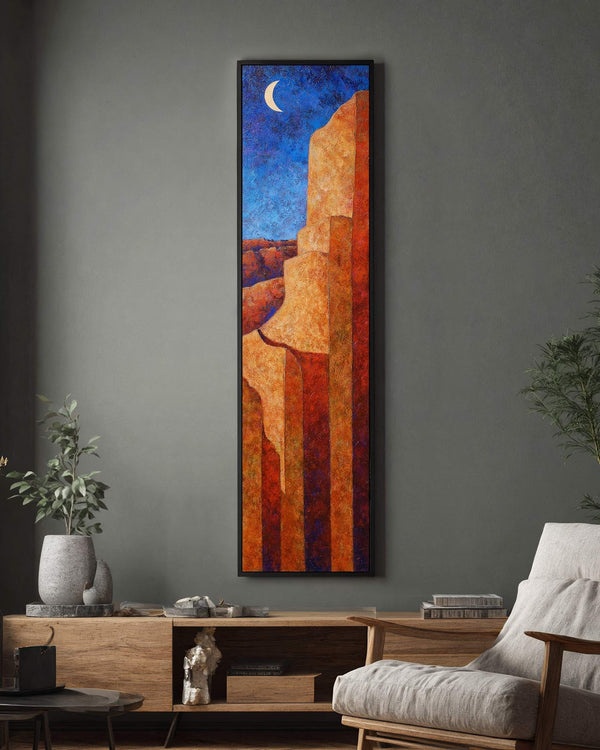 Vertical canvas wall art in interior setting.