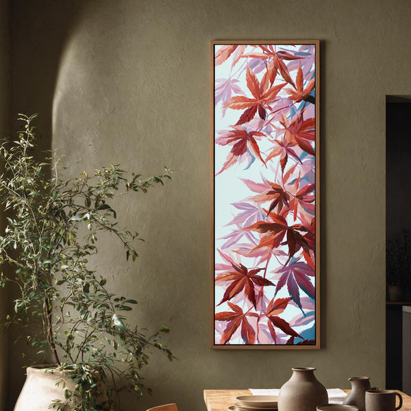Vertical canvas wall art in interior setting.