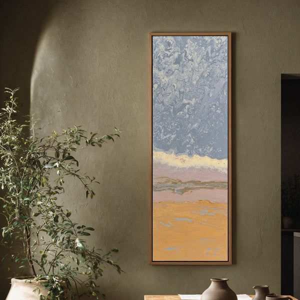 Vertical canvas wall art in interior setting.