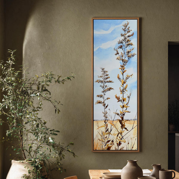 Vertical canvas wall art in interior setting.