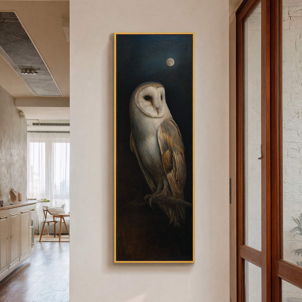 This vertical, realistic oil painting print on canvas depicts a barn owl perched on a branch under a full moon. The artwork is framed in gold and hangs on a.
