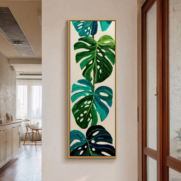 Vertical canvas wall art in interior setting.