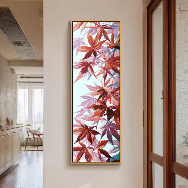Vertical canvas wall art in interior setting.