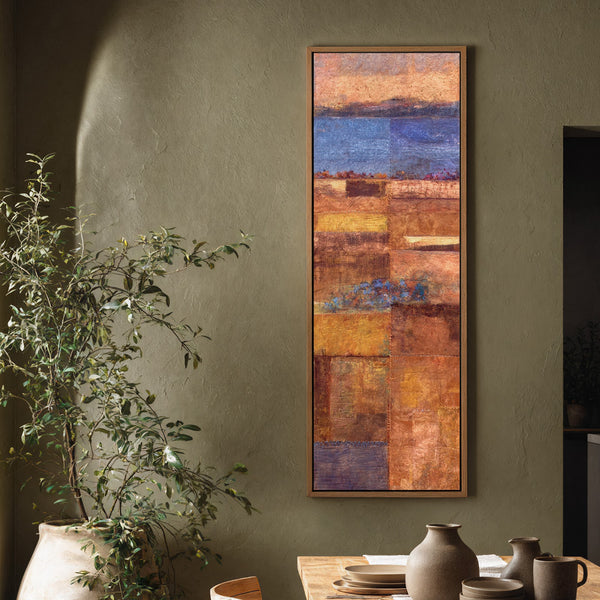 Vertical canvas wall art in interior setting.