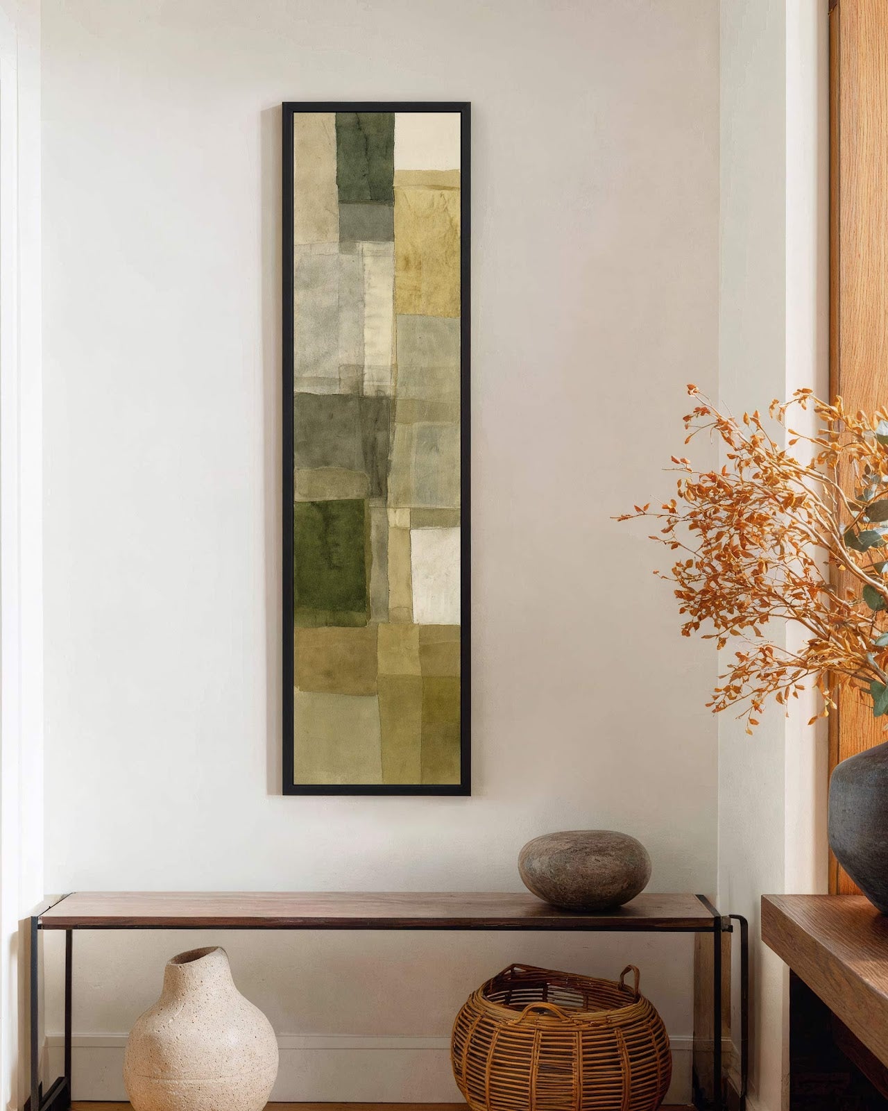 Vertical canvas wall art in interior setting.