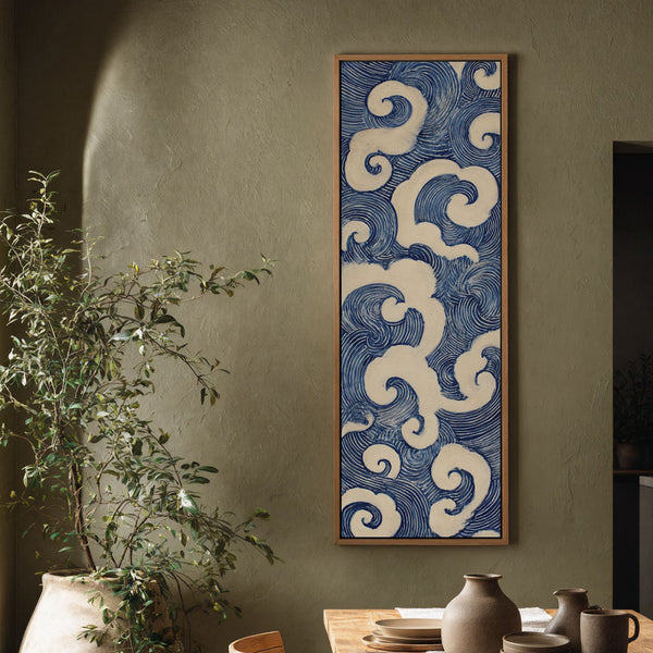 Vertical canvas wall art in interior setting.