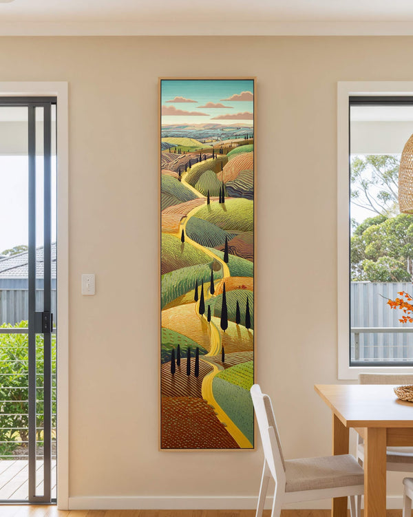 Vertical canvas wall art in interior setting.