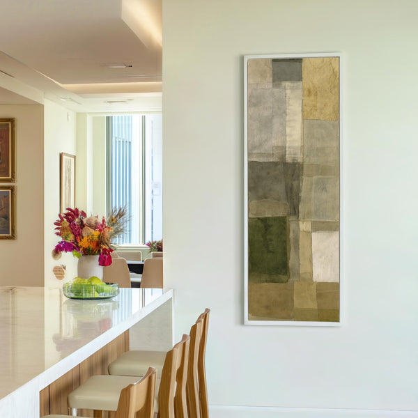 Vertical canvas wall art in interior setting.