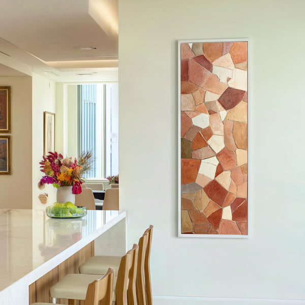 Vertical canvas wall art in interior setting.