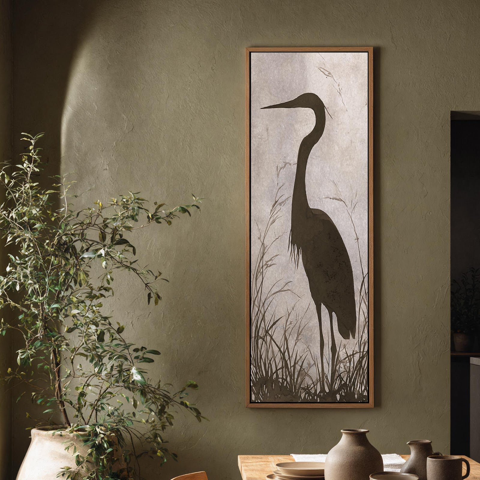 Vertical canvas wall art in interior setting.