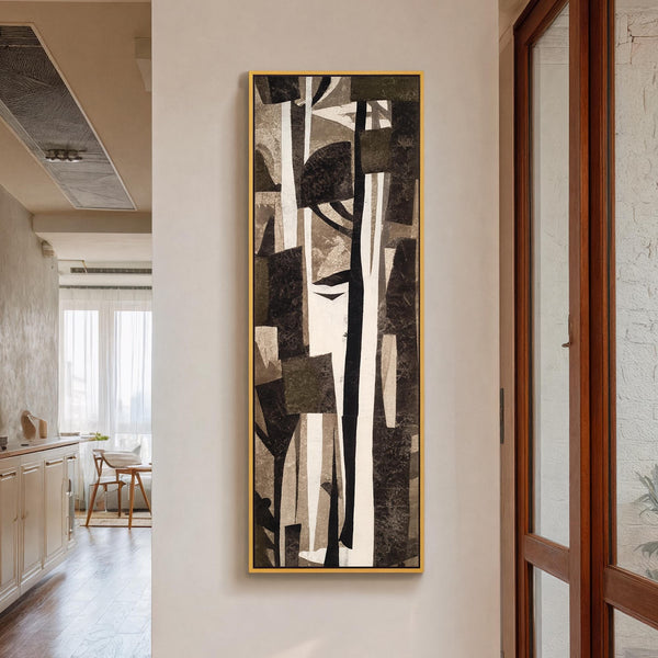 Vertical canvas wall art in interior setting.
