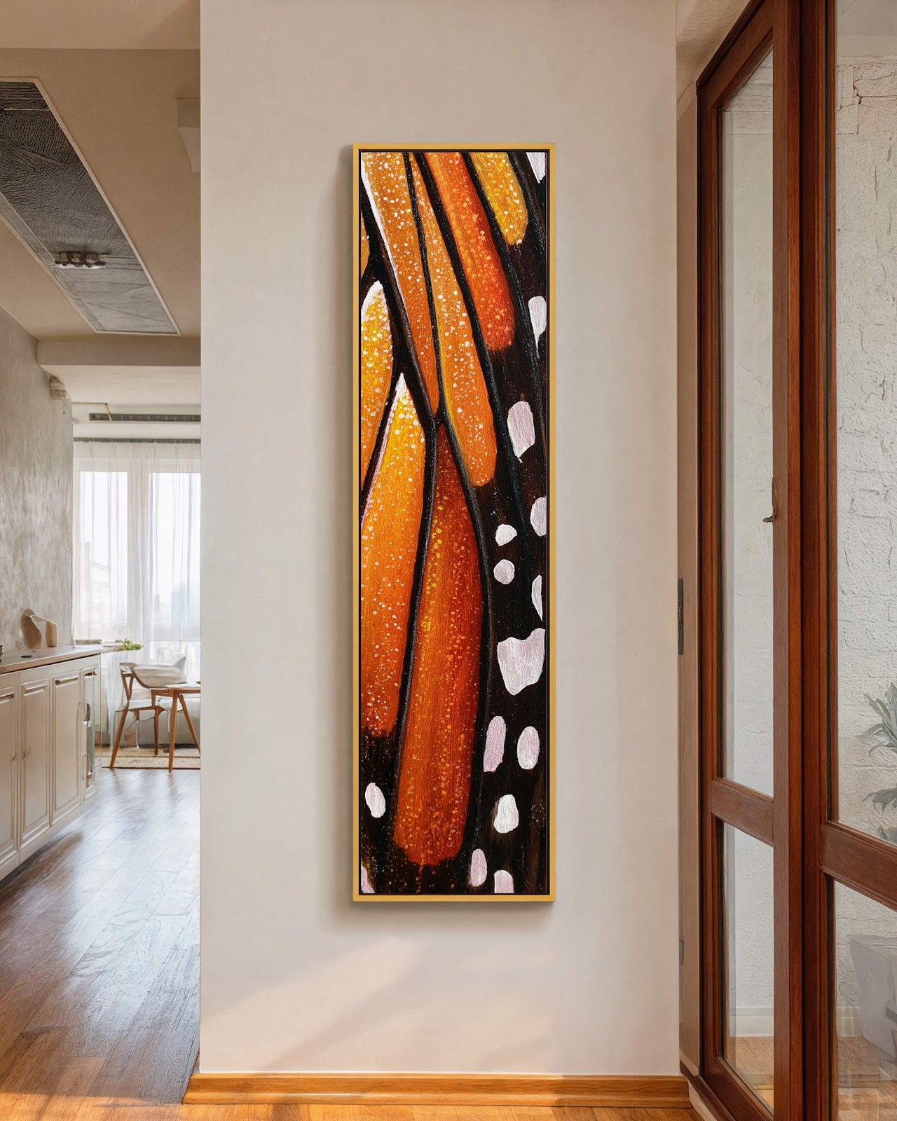 Vertical canvas wall art in interior setting.