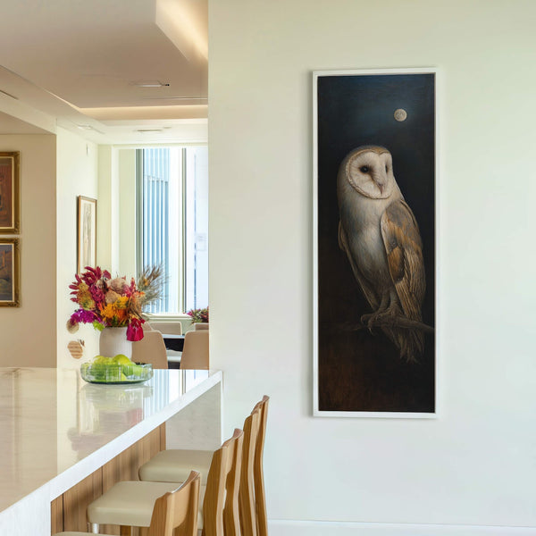 This is a vertical canvas wall art print featuring a realistic barn owl perched on a branch against a dark background with a moon, framed in white and displayed on.