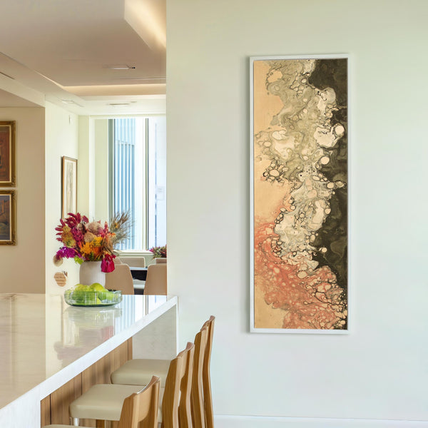 Vertical canvas wall art in interior setting.