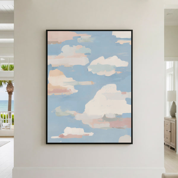 Large abstract cloud painting with soft pink, peach, sage green and cream clouds drifting across a pale blue sky, featuring visible brushstrokes perfect for statement wall decor
