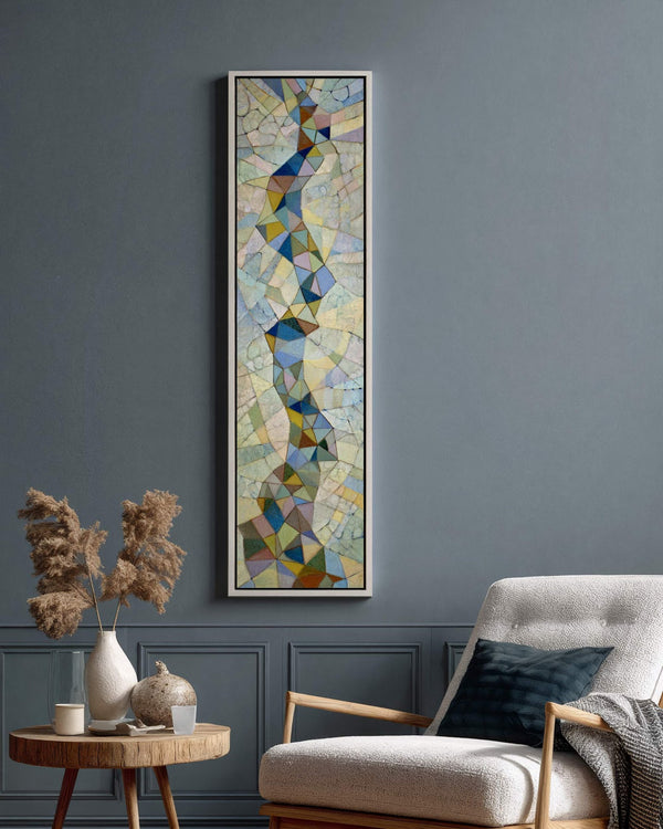 Vertical canvas wall art in interior setting.