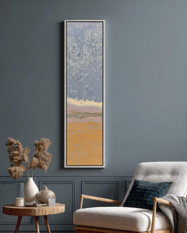 Vertical canvas wall art in interior setting.
