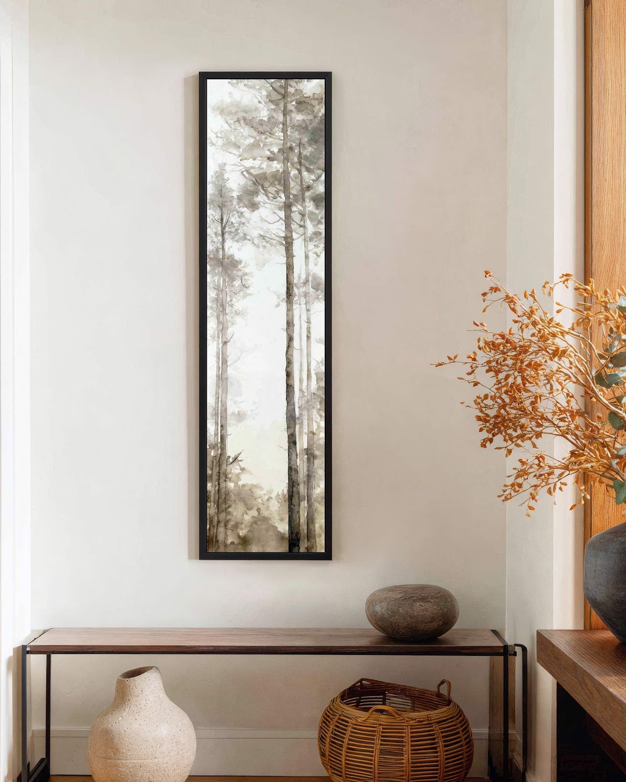 Vertical canvas wall art in interior setting.